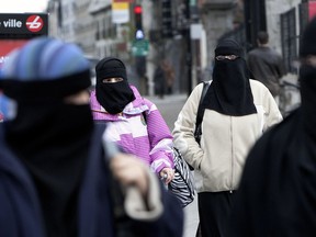 April 17, 2010: Marchers stage protest in Montreal against a ban on face coverings. A petition demanding Law 62 be suspended has already garnered more than 13,800 signatures.