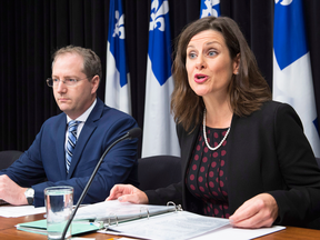 Quebec Justice Minister Stephanie Vallee speaks about Bill 62 with Justice Minister Yan Paquette on Oct. 24, 2017.