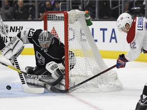 Canadiens winger Artturi Lehkonen tries to get a shot in on Kings goalie Jonathan Quick during the first period of an NHL hockey game, Wednesday, Oct. 18, 2017, in Los Angeles.