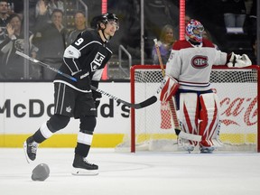 Los Angeles Kings left wing Adrian Kempe, left, of Sweden, skates to his bench while hats rain down on the ice after scoring his third goal of the game as Montreal Canadiens goalie Al Montoya watches during the third period of an NHL hockey game, Wednesday, Oct. 18, 2017, in Los Angeles. The Kings won 5-1.