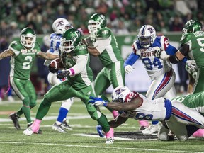 Saskatchewan Roughriders running back Trent Richardson (33) breaks a tackle as he runs the ball down field during second half CFL football action against the Montreal Alouettes in Regina on Friday, October 27, 2017. THE CANADIAN PRESS/Rick Elvin ORG XMIT: RE118
Rick Elvin,