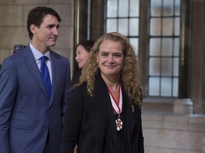 Governor general-designate Julie Payette, right, arrives on Parliament Hill with Prime Minister Justin Trudeau before her installation as Canada's 29th Governor General, in Ottawa on Monday, Oct. 2, 2017.