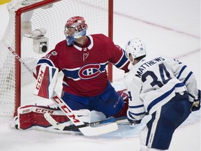 Maple Leafs' Auston Matthews scores on Canadiens goalie Carey Price during overtime in Montreal on Saturday, Oct. 14, 2017.