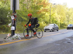 Cyclists gathered on Mount Royal Friday to remember Clément Ouimet, who died after being struck Wednesday, while riding on Camillien-Houde Way. (Allen McInnis / Montreal Gazette)