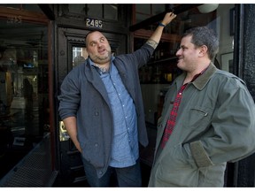 Fred Morin, right, and David McMillan pose for a photograph outside their restaurant Joe Beef in Montreal, Thursday, Sept., 8, 2011.