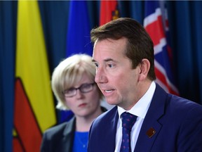 Scott Brison, President of the Treasury Board, answer questions on the payroll system Oct. 5, with Public Works Minister Carla Qualtrough.