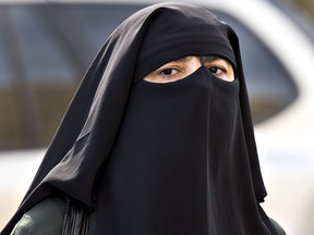 Although Quebec's Bill 62 does not specifically mention niqabs or burkas, a person riding a Montreal city bus would have to have their face uncovered for the duration of the ride unless they go to court and invoke going to court and invoke a religious accommodation clause.