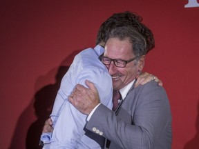 Richard Hebert, Liberal candidate for the byelection in the Lac-Saint-Jean riding, right, hugs Prime Minister Justin Trudeau during a Liberal party rally in Dolbeau-Mistassini, Que, on Thursday, October 19, 2017. THE CANADIAN PRESS/Francis Vachon ORG XMIT: XFRV-113
FRANCIS VACHON,