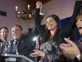 Coalition Avenir Québec candidate Geneviève Guilbault celebrates her victory with leader François Legault, in a provincial byelection in the riding of Louis-Hébert, Monday, October 2, 2017 in Quebec City.