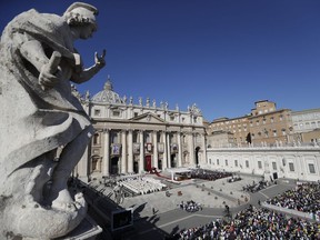 Faithful gather in St. Peter's Square during a canonization mass for 35 new saints celebrated by Pope Francis at the Vatican, Sunday, Oct.15, 2017.