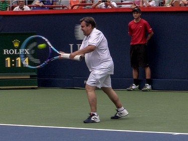 Mayor Denis Coderre needed all the help he could get to return a serve from Canadian tennis star Milos Raonic at Uniprix Tennis Stadium in Montreal, on Friday, August 7, 2015.