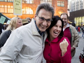 Richard Bergeron greets Valerie Plante as they prepare to take part in a march and vigil to raise awareness of the issue of homelessness in Montreal on Oct. 20, 2017.