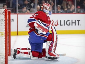 Montreal Canadiens' Carey Price rests on one knee while waiting for a faceoff in the Los Angeles Kings' end in Montreal Thursday Oct. 26, 2017.