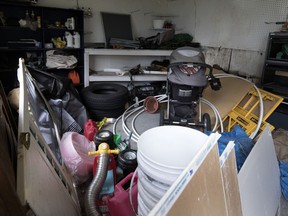 Baby carriage is among items in the shed of the Ste-Marthe-sur-le-Lac home of a woman suspected of killing three of her babies.