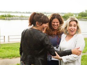 Mohawk Girls director Tracey Deer, left, and head writer Cynthia Knight share a laugh with APTN executive director of programming and scheduling Monika Ille.