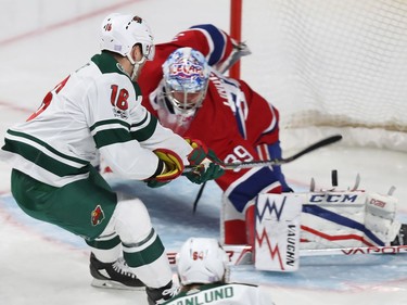 Minnesota Wild's Jason Zucker (16) scores shorthanded goal on Montreal Canadiens goalie Charlie Lindgren, during third period NHL action in Montreal on Thursday November 9, 2017.