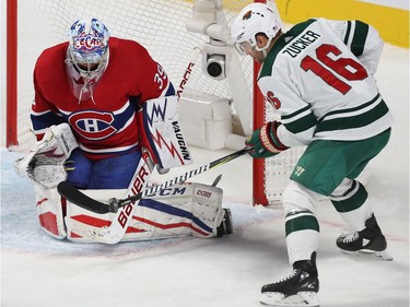 Montreal Canadiens goalie Charlie Lindgren stops shot by Minnesota Wild's Jason Zucker (16) during third period NHL action in Montreal on Thursday November 9, 2017.