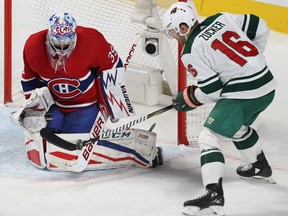 Canadiens goalie Charlie Lindgren stops shot by Minnesota Wild's Jason Zucker during third period NHL action in Montreal on Thursday, Nov. 9, 2017.