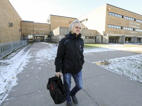 “I’m all for respect," says Roland Bérard, pictured outside the complex that houses the Antoine-Brossard pool, "but when I’m taking my shower, I don’t want to wear my bathing suit.”