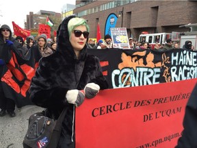 Protesters march in a demonstration against systemic racism Nov. 12, 2017 in Montreal.