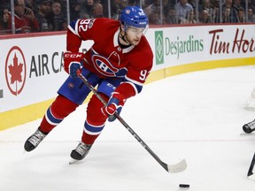The Canadiens' Jonathan Drouin looks to move the puck out of the corner against the Columbus Blue Jackets during game at the Bell Centre in Montreal on Nov. 14, 2017.