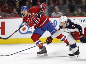 Montreal Canadiens' defenceman Shea Weber takes a shot on net as Columbus Blue Jackets defenceman Jack Johnson tries to block him during NHL action in Montreal on Tuesday, November 14, 2017.