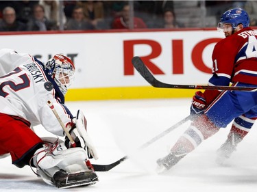 Montreal Canadiens left wing Paul Byron watches as the puck sails over Columbus Blue Jackets goalie Sergei Bobrovsky as Byron scores to tie the game during NHL action in Montreal on Tuesday November 14, 2017.
