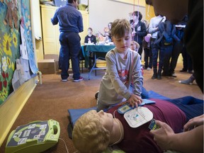 Edouard MacGillivary learns about CPR during Exposcience 2017 held at Pointe-Claire's Stewart Hall this past weekend. The interactive science exhibitions for all ages was organized by Concordia University science students.