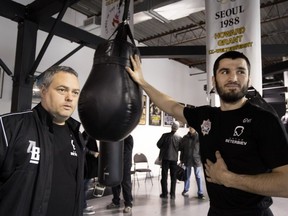 World champion Artur Beterbiev with his trainer, Marc Ramsay, left, at Rival Boxing Gym in Montreal on Thursday November 16, 2017.