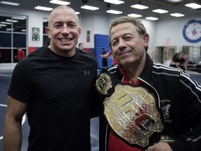 UFC star Georges St-Pierre has given his most recent UFC championship belt to Victor Zilberman of the Reinitz Wrestling Center, in Montreal on Wednesday, November 15, 2017.