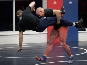 UFC star Georges St-Pierre trains at the Reinitz Wrestling Centre in Montreal on Wednesday Nov. 15, 2017.