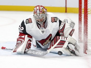 Arizona Coyotes goalie Antti Raanta extends his leg to make a save during third period of National Hockey League game against the Montreal Canadiens in Montreal Thursday November 16, 2017.