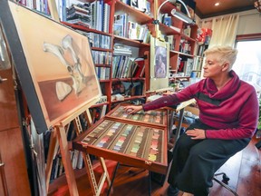 Carole Dumais works on a sketch in the art studio in her home in the Plateau Mont-Royal district of Montreal.