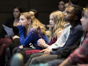 Young people listen to a presentation as they take part in Forum for Children in Montreal on Monday Nov. 20, 2017.