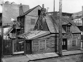 Herbert Ames brought attention to the appalling living conditions of the working-class poor in south-west Montreal (1903 photo).