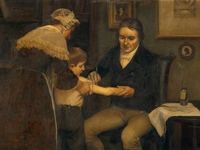 Dr. Edward Jenner performing his first vaccination on 8-year-old James Phipps in England in 1796.