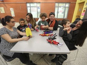 Ashley Stupendick, Tanya D'Amato and son Mason, Loren Dafniotis and son Tristan, and Nadia Wiseman with son Aidan are there for each other at Single MOMtreal.  (John Mahoney / MONTREAL GAZETTE)