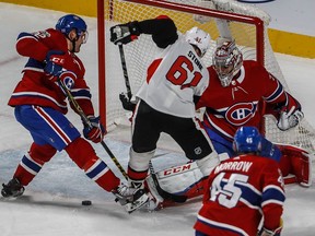 Montreal Canadiens vs Ottawa Senators

MONTREAL, QUE.: NOVEMBER 29, 2017 -- The puck lies perilously between the legs of Montreal Canadiens defenseman Karl Alzner (22) in front of goalie Carey Price (31) with Ottawa Senators right wing Mark Stone (61) unable to get to it during 3rd period action at the Bell Centre in Montreal, on Wednesday, November 29, 2017. (Dave Sidaway / MONTREAL GAZETTE) ORG XMIT: 59819

Wednesday, November 29, 2017 at 10:52:04 PM
Dave Sidaway, Montreal Gazette