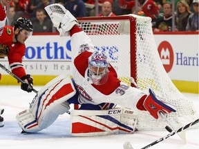 Charlie Lindgren #39 of the Montreal Canadiens makes a save against the Chicago Blackhawks at the United Center on November 5, 2017 in Chicago, Illinois.