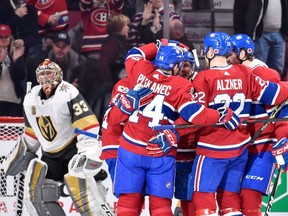 Brendan Gallagher (#11) of the Montreal Canadiens celebrates his first-period goal with teammates against the Vegas Golden Knights during the NHL game at the Bell Centre on November 7, 2017 in Montreal.