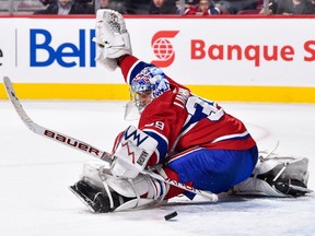 Canadiens' Charlie Lindgren makes a key save late in the third period against the Vegas Golden Knights Tuesday night at the Bell Centre.
