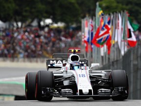 Lance Stroll of Canada driving the (18) Williams Martini Racing Williams FW40 Mercedes in the Pitlane during qualifying for the Formula One Grand Prix of Brazil at Autodromo Jose Carlos Pace on November 11, 2017 in Sao Paulo, Brazil.