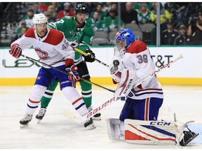 Charlie Lindgren #39 of the Montreal Canadiens makes a save against the Dallas Stars in the third period at American Airlines Center on November 21, 2017 in Dallas, Texas.