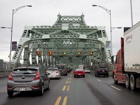 Traffic lines up on the Jacques Cartier Bridge during the morning rush hour in Montreal Oct. 24, 2017.