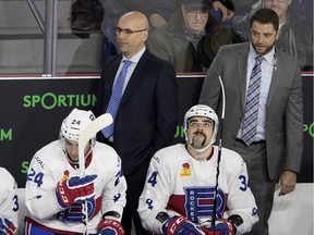 Laval Rockets head coach Sylvain Lefebvre, left and assistant coach Nick Carriere watch a line change during AHL action in Montreal on Friday November 17, 2017.