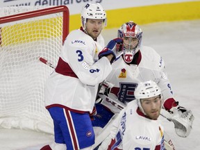 Laval Rocket defenceman Jakub Jerabek, left, with goalie Zachary Fucale,  and center Jeremy Gregoire, watch the play during AHL action against the Lehigh Valley Phantoms in Laval on Nov.17, 2017. Jerabek was called up by the Canadiens on Wednesday.