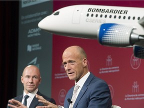 Bombardier president and CEO Alain Bellemare, left, looks on as Airbus CEO Tom Enders speaks during a business meeting in Montreal, Friday, Oct. 20, 2017.