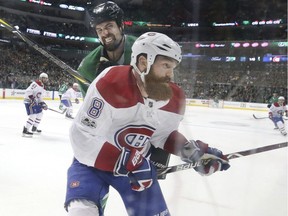Jordie Benn, Jamie Benn

Montreal Canadiens defenseman Jordie Benn (8) is hit by Dallas Stars left wing Jamie Benn (14) during the first period of an NHL hockey game in Dallas, Tuesday, Nov. 21, 2017. (AP Photo/LM Otero) ORG XMIT: DNA103

EDS- IMAGE MADE THROUGH GLASS
LM Otero, THE ASSOCIATED PRESS