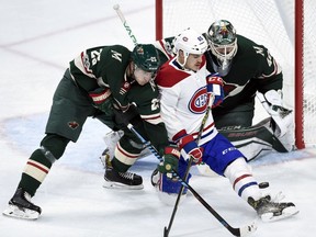 Jonas Brodin, Devan Dubnyk, Andrew Shaw

Montreal Canadiens right wing Andrew Shaw (65) keeps Minnesota Wild defenseman Jonas Brodin (25), of Sweden, from the puck after it rebounded off Wild goalie Devan Dubnyk (40) during the third period of an NHL hockey game Thursday, Nov. 2, 2017, in St. Paul, Minn. (AP Photo/Hannah Foslien) ORG XMIT: MNHF109
Hannah Foslien, AP