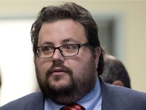 Former Quebec Liberal cabinet minister Tony Tomassi arrives in court in Quebec City, Thursday, June 5, 2014.